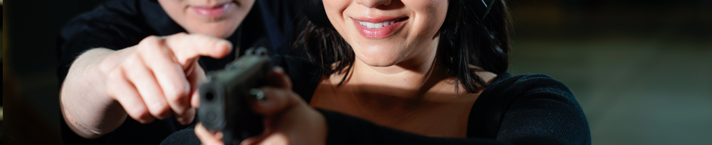 woman being taught how to look through her sights