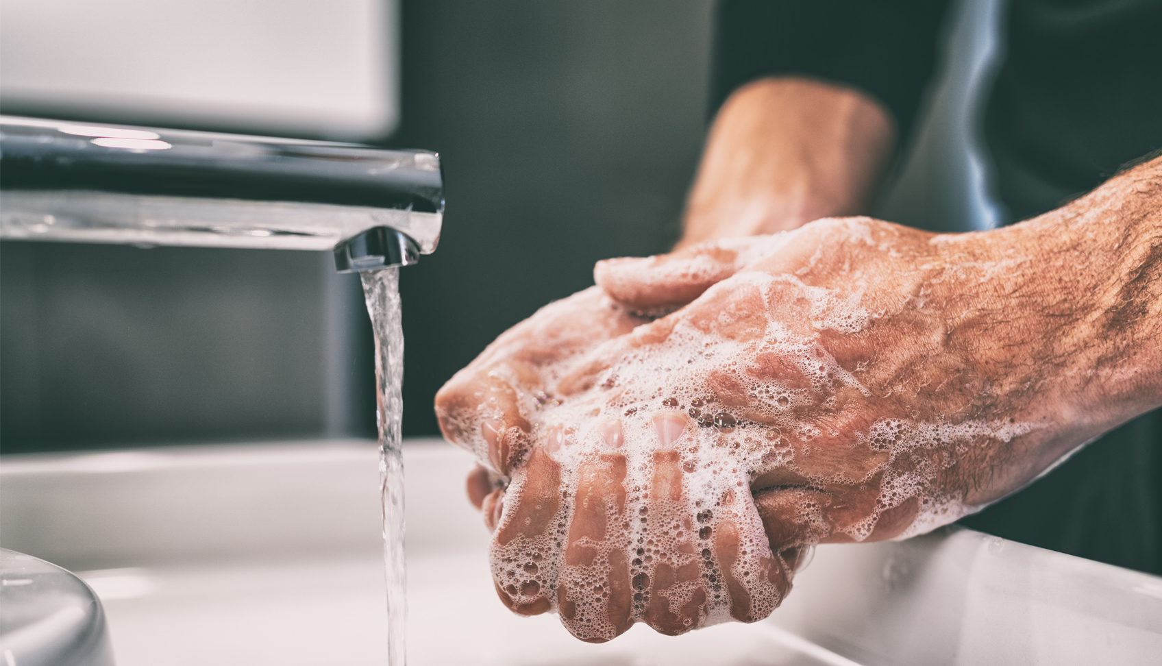 Man washing his hands