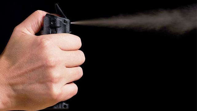 OC spray being deployed